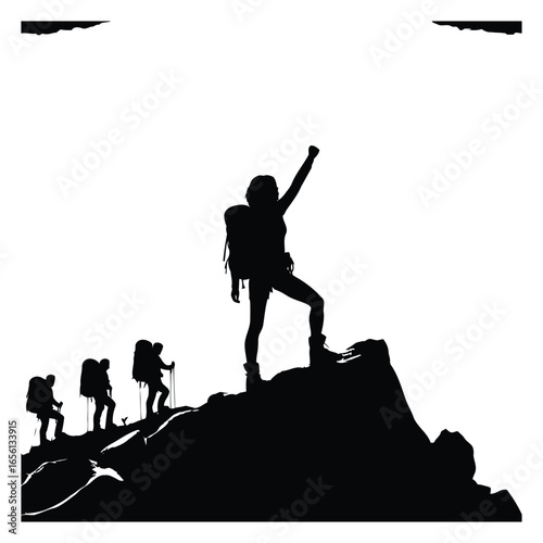 Silhouette of climbers reaching mountain summit