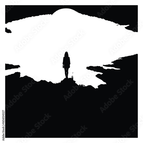 Lone figure against a vast mountain silhouette