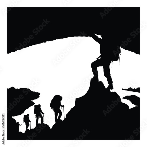 Silhouette of hikers ascending a mountain peak