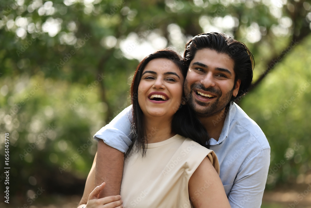 Fototapeta premium Couple Enjoying A Joyful Moment Outdoors In Nature