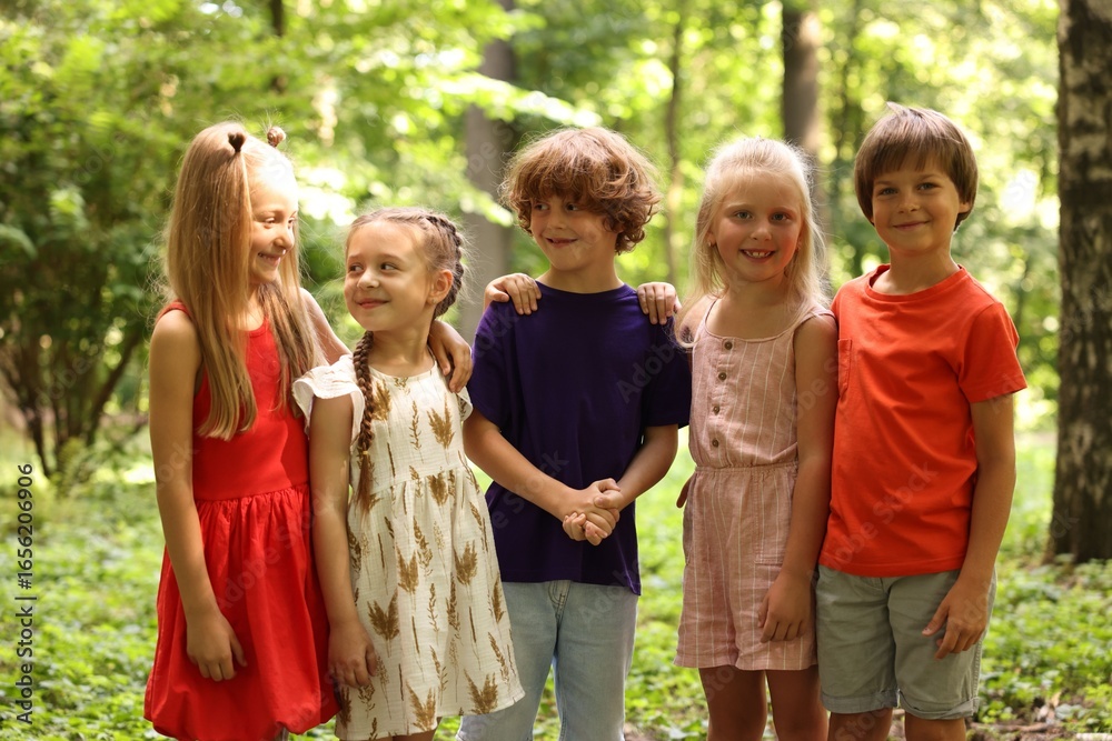 Fototapeta premium Group of cute little kids in park