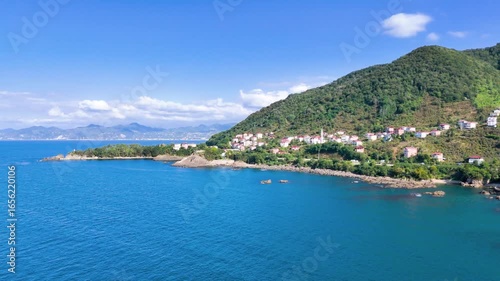 Drone Flying from the Blue Black Sea to Green Mountains with Villages – 4K Aerial View