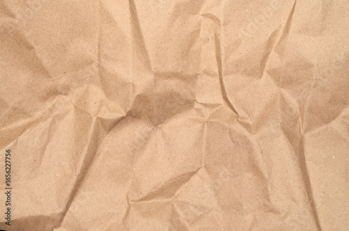 Craft paper texture. Rough creased surface ideal for packaging, wrapping, DIY projects, scrapbooking, arts, design, and creative applications.