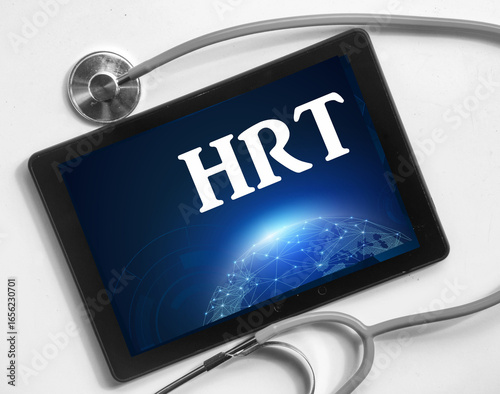 stethoscope on tablet with HRT text