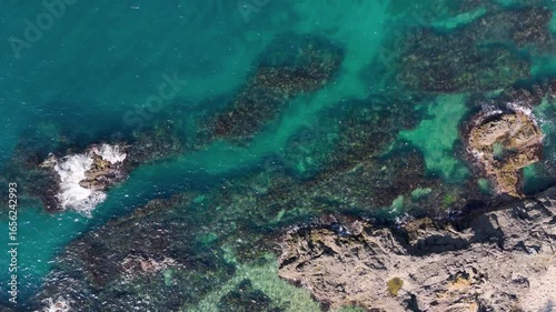 Magnificent Rocky Coastline and Waves Crashing – Stunning 4K Aerial Slow Motion