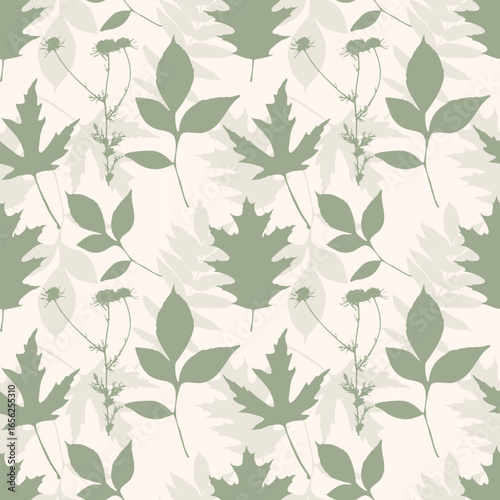 Green textile pattern. Autumn Vibe. Beige soft pattern with leaves silhouettes. Herbarium.