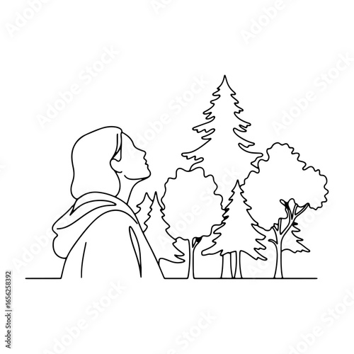 An image of a traveler fascinated by the beauty of mountains and forests; ideal for travel blogs, logos, or graphical elements.