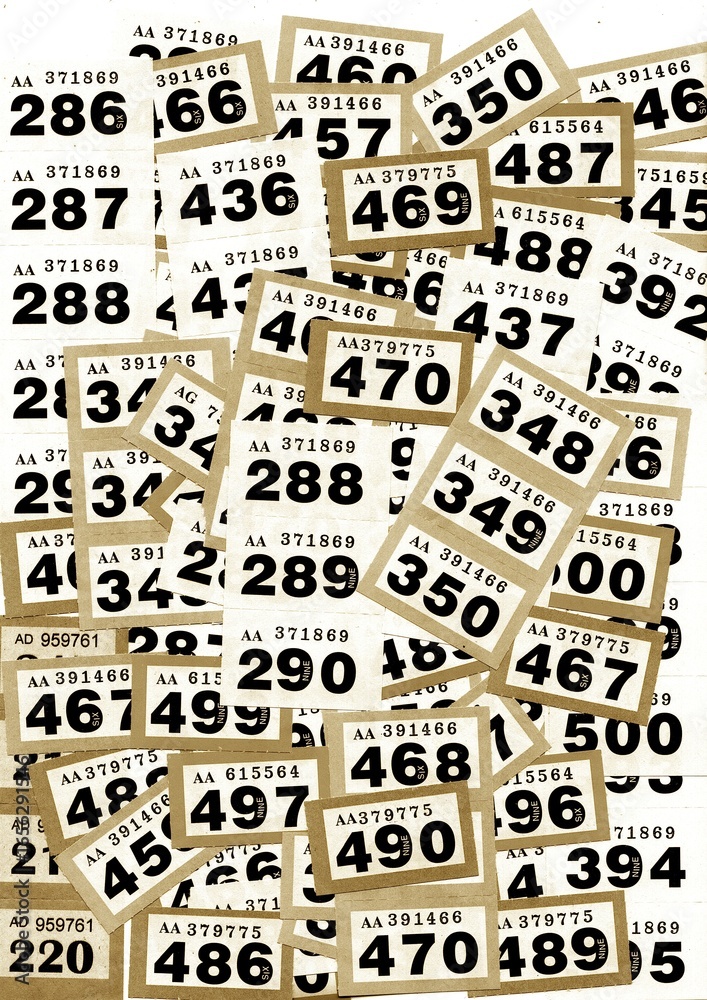 Obraz premium A montage of vintage raffle tickets in sepia.