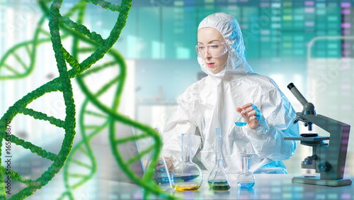 Geneticist at work desk. Tr...