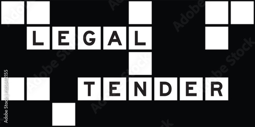 Alphabet letter in word legal tender on crossword puzzle background