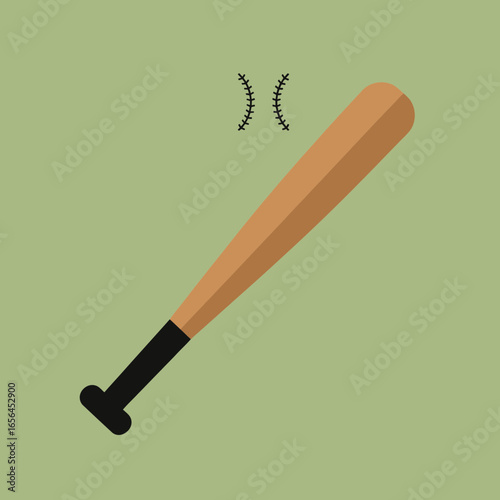 Wooden baseball bat with black grip on green background.