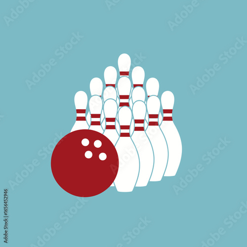 Bowling ball and pins arranged for a game.