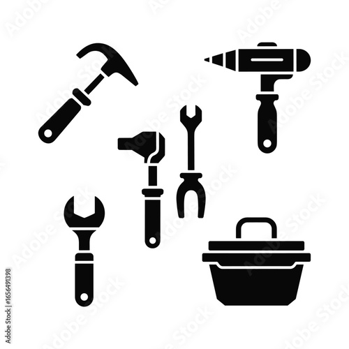 Collection of silhouetted hand tools and toolbox for diy projects