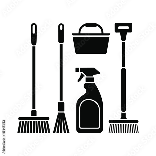 Silhouette collection of cleaning tools including brooms a bucket and a spray bottle