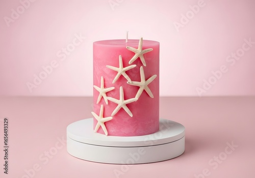 A burning red Christmas candle isolated on a light pink background, a festive holiday decoration