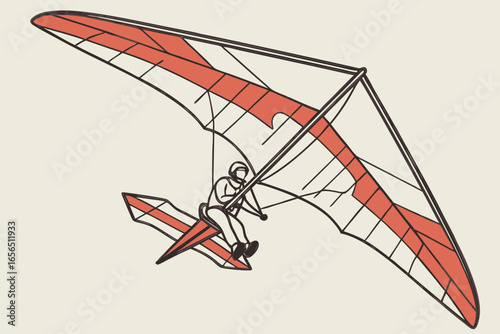 Hang glider with pilot soaring in the sky
