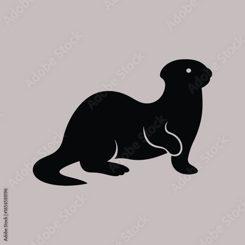 Silhouette of a playful otter standing on its hind legs