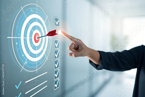 Hand pointing at futuristic digital target with arrow hitting bullseye