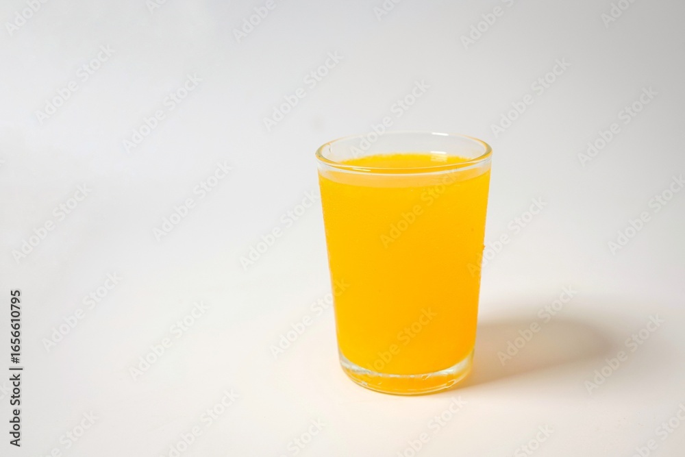 Orange juice in a glass on white background Orange juice in a glass on white background