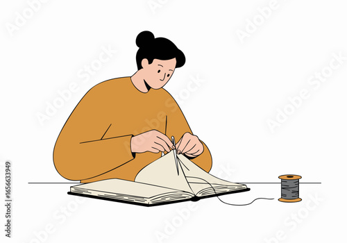 A person meticulously hand-sewing an open book, illustrating the detailed process of traditional bookbinding or crafting.