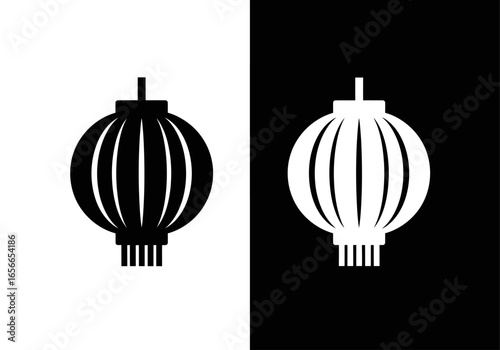 Contrasting Lanterns: A captivating contrast of light and shadow plays out with two identical lanterns, one a stark black on a pristine background.