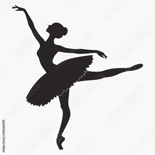 Silhouette of a ballerina in a tutu performing a graceful pose