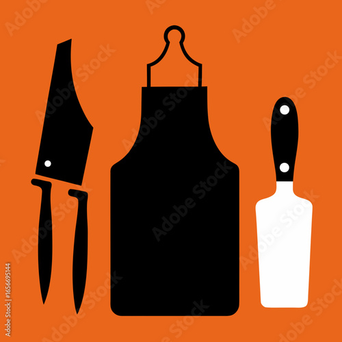 Black apron cleaver spatula white dots orange background