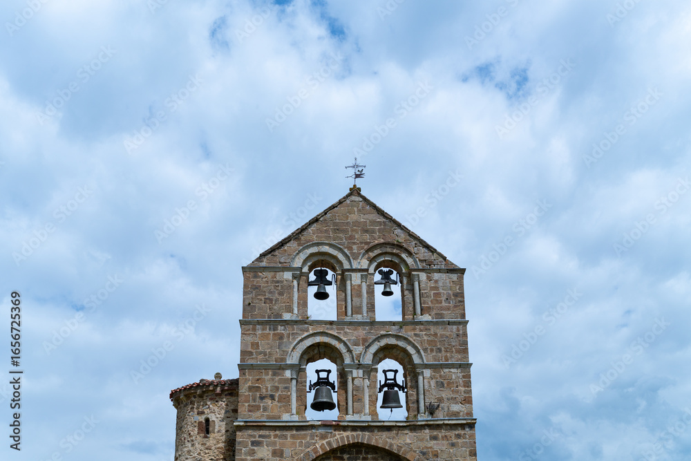 Fototapeta premium Collegiate Church of San Salvador de Cantamuda in the municipality of La Pernía in the Palencia Mountains. Province of Palencia, Castile and Leon, Spain. Europe