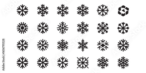A collection of various black snowflake designs arranged in rows on a white background surface