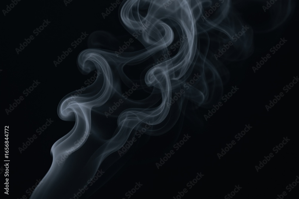 Fototapeta premium Ethereal Smoke Stream: Captivating White Plumes Against a Dark Background, Abstract and Mesmerizing