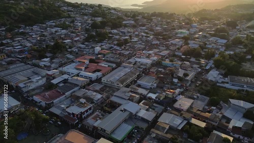 Sunset in a big city in front of a lake