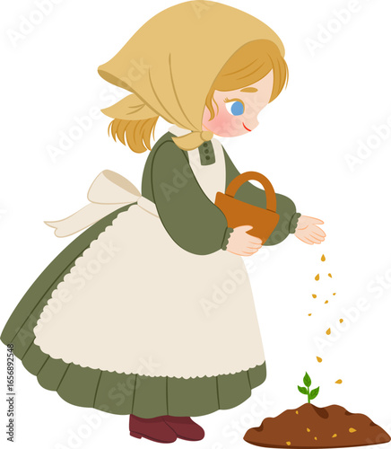 little girl planting seeds into soil