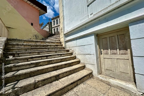 Composition on a stair street in Balchik with vintage elements and vanishing point.