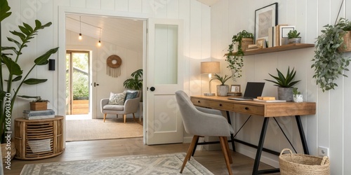 Bright Home Office with Wood Desk, Chair, Plants, White Walls and a View to another room