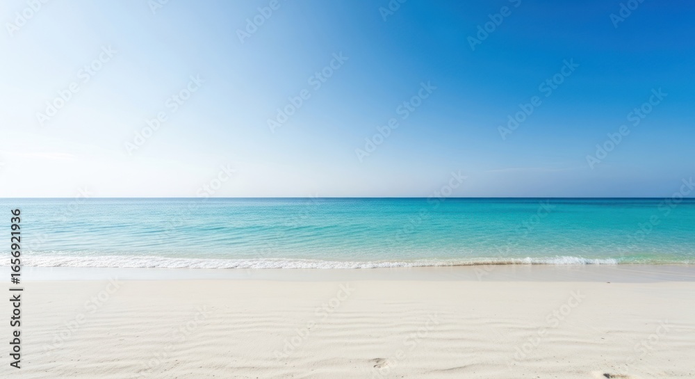 Fototapeta premium Tranquil beach scene; bright blue sky, turquoise water, soft white sand
