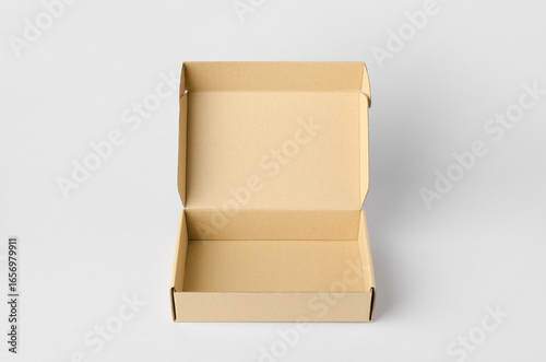 Kraft cardboard mailing box mockup on a gray background