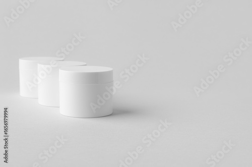 White plastic cosmetic cream jar mockup on neutral background