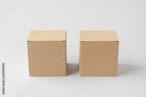 Kraft cardboard packaging box mockup on neutral background