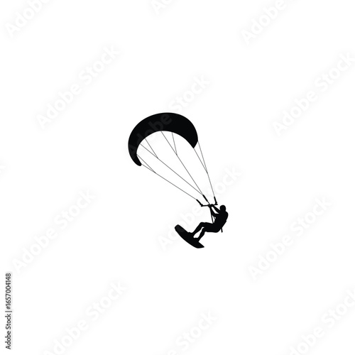 Silhouette of a kitesurfer riding a board with a large kite against a white background