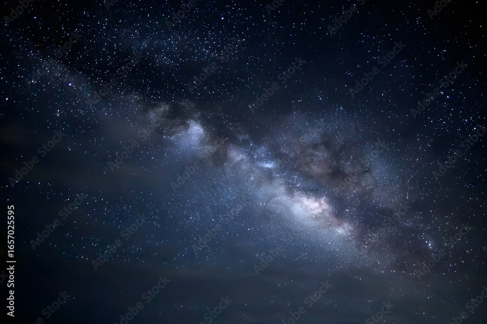 Fototapeta premium minimalist view capturing night sky with glimmering stars and distant milky way enveloped by dark vastness offers ample