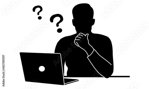 ノートパソコンを前に悩む男性のシルエット