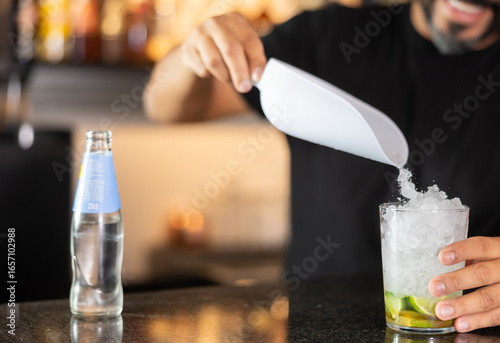 Wallpaper Mural Bartender prepares preparing refreshing Mojito drink Torontodigital.ca