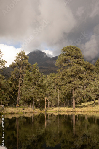 view of Iztaccihuatl volcano from Nahualac lagoon