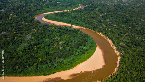 Navigating the Heath River, a natural border between Peru and Bolivia, a biodiverse place filled with pristine forests