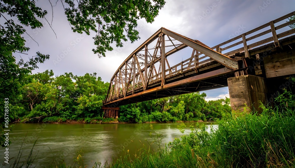 Fototapeta premium Rusty bridge over a river