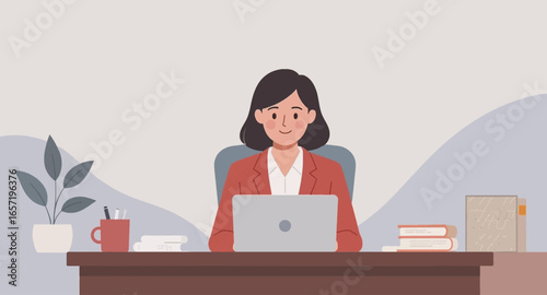 A focused professional woman works diligently on her laptop at a modern office desk, embodying productivity and digital work lifestyle.