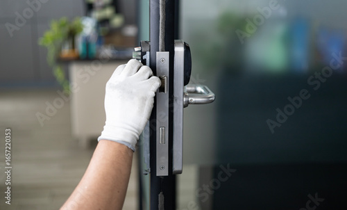 Construction worker repairing the door