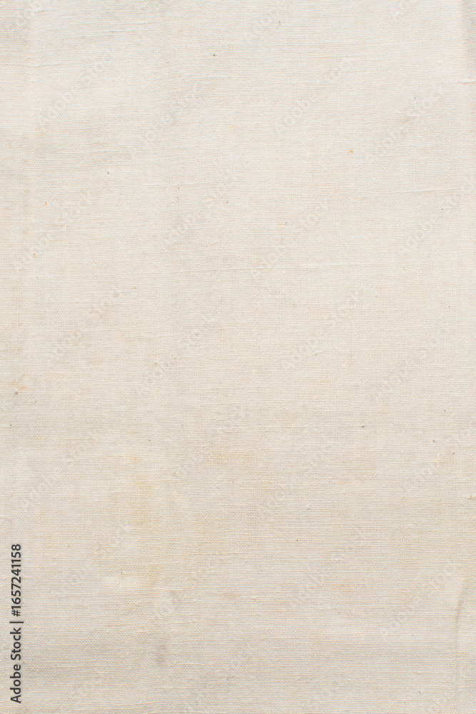 Fototapeta premium Close up view of cream linen fabric, texture of woven cream cotton fabric