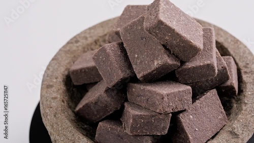 Traditional Indonesian Shrimp Paste Terasi on mortar stone