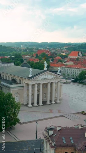 Aerial vertical early summer morning view of The Cathedral Square, key location of Vilnius Old Town. Deserted sunrise city landscape. The Cathedral. Vilnius, Lithuania.